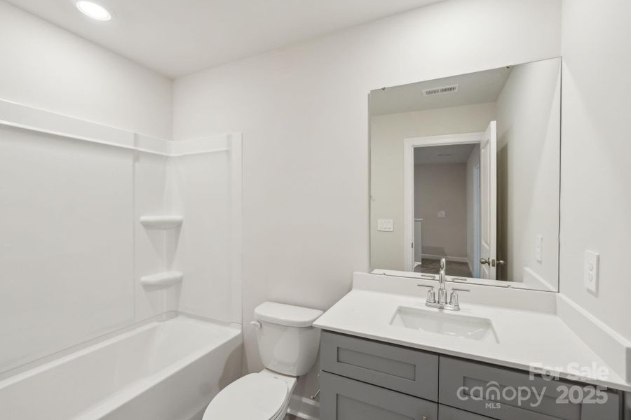 Photo is not of the actual home, but is an inspirational photo of builder’s model home and may depict options, furnishings, and/or decorator features that are not included