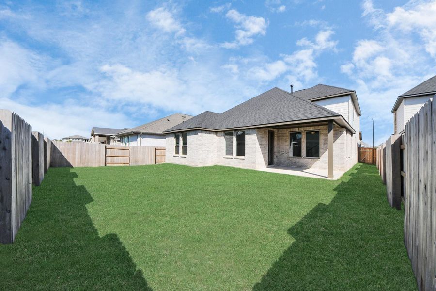 Exterior details and patio area of a home in 50' Traditional Homes at Elyson, Katy (Image 4). Exterior details and patio area of a home in 50' Traditional Homes at Elyson, Katy (Image 4).