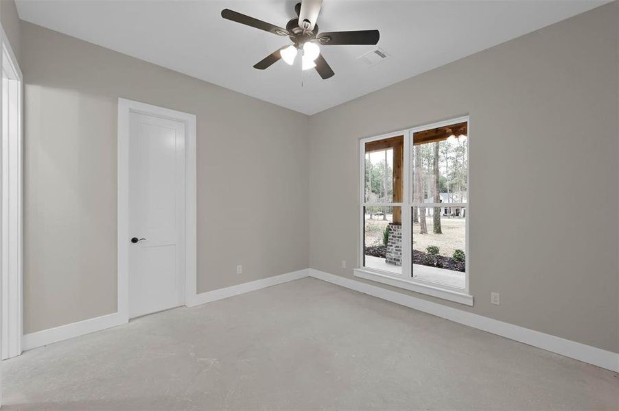 Bedroom 3 with views of the front porch.