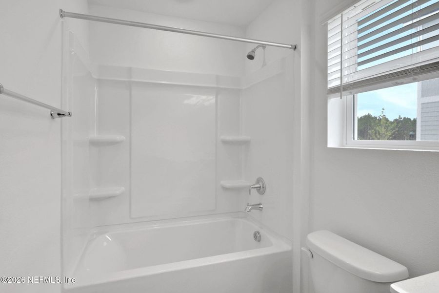 Furnished interior view inside a new home in Amberly, Green Cove Springs (Image 13).