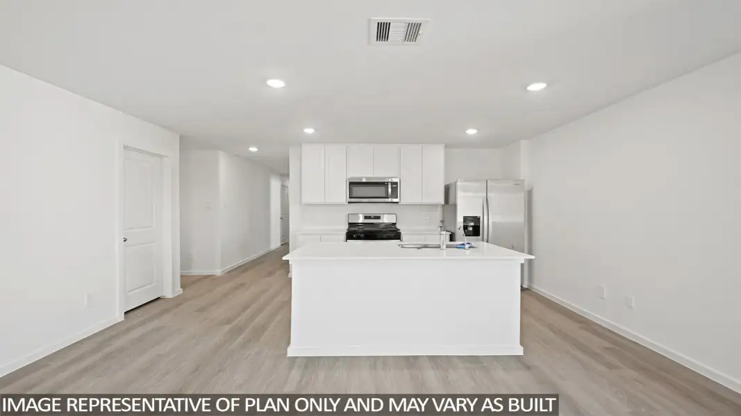 Furnished interior view inside a new home in Sunterra, Katy (Image 5).