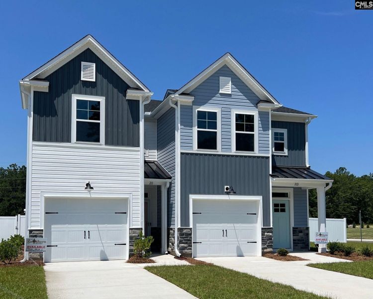 Front exterior of a new home in Walker’s Trail, Lexington, SC, highlighting curb appeal (Image 1). Front exterior of a new home in Walker’s Trail, Lexington, SC, highlighting curb appeal (Image 1).