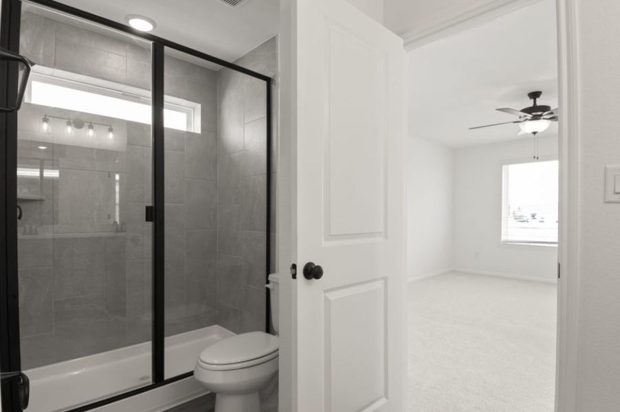 Furnished interior view inside a new home in Trace, San Marcos (Image 16).