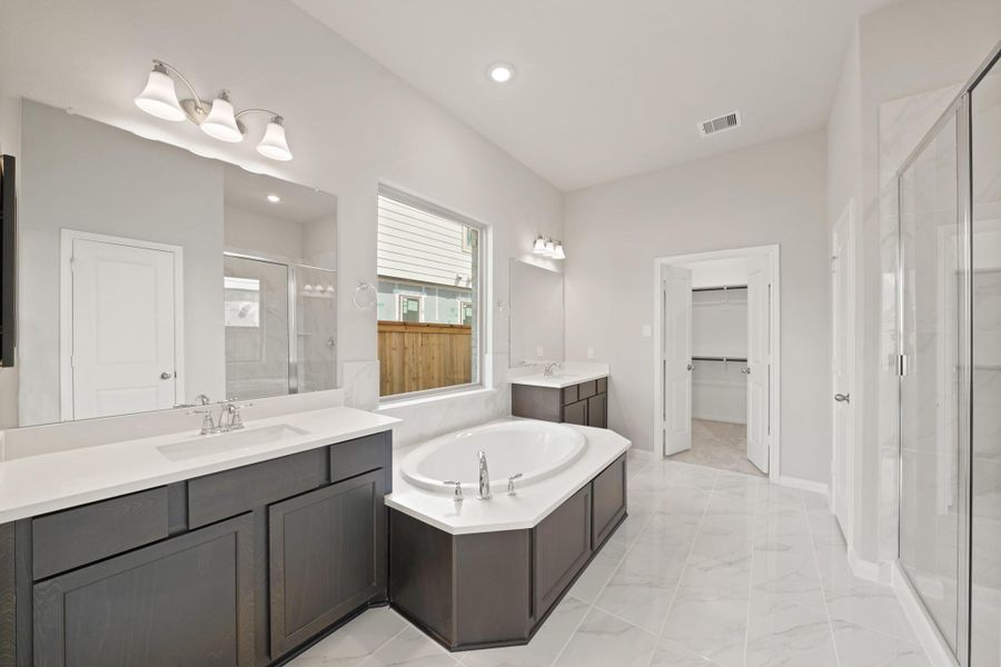 Furnished interior view inside a new home in Bridgeland 55', Cypress (Image 11).