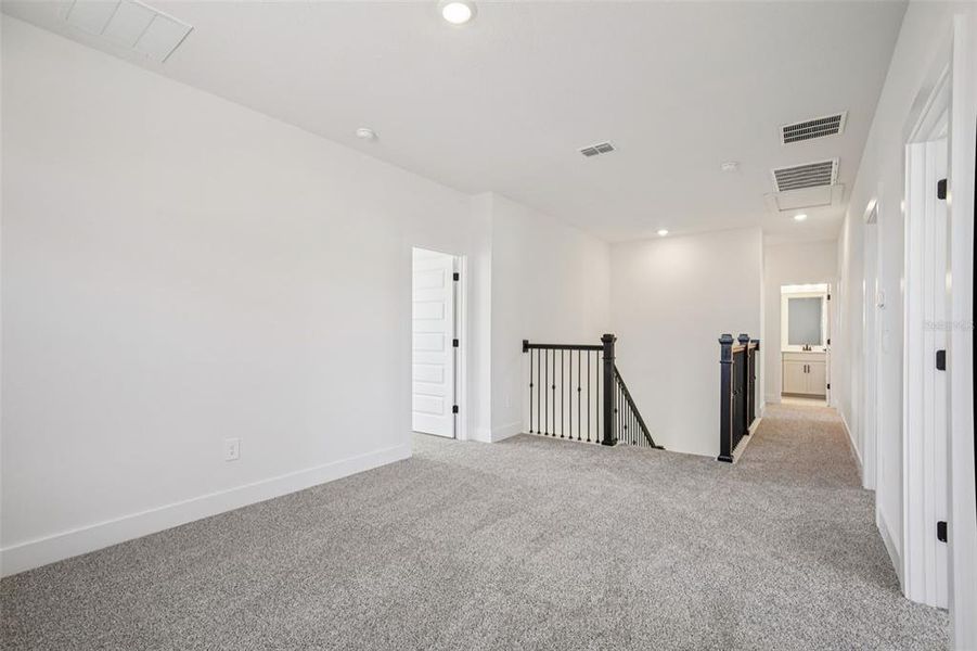 Spacious, unfurnished interior of a new home in Magnolia Bay - Reserve Series, Nokomis (Image 20).