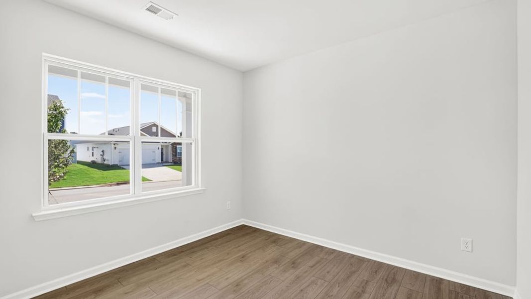 Spacious, unfurnished interior of a new home in Durbin Meadows Traditions, Fountain Inn (Image 17).