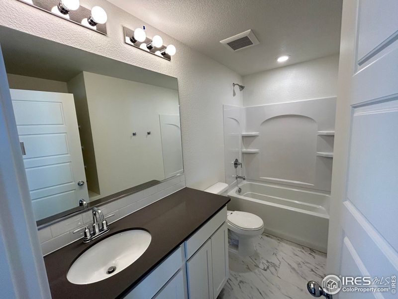 Furnished interior view inside a new home in Liberty Draw, Evans (Image 9).