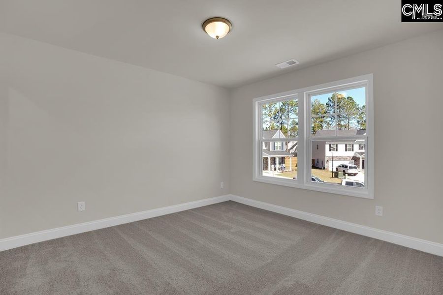 Spacious, unfurnished interior of a new home in Cottages at Roofs Pond, West Columbia (Image 29).