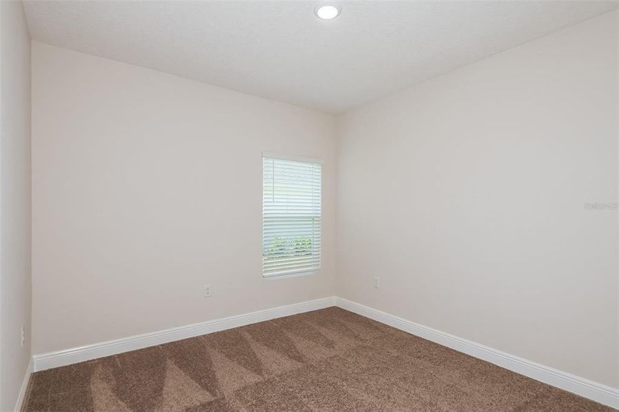 Spacious, unfurnished interior of a new home in Pasadena Landing, Wesley Chapel (Image 18).