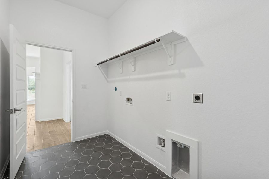 Laundry room (*Photo not of actual home and used for illustration purposes only.)