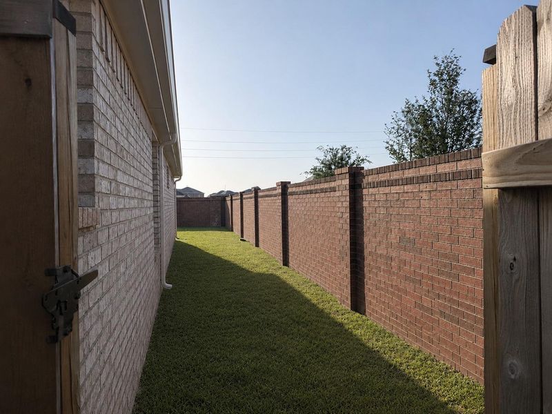 Exterior details and patio area of a home in , Katy (Image 27).