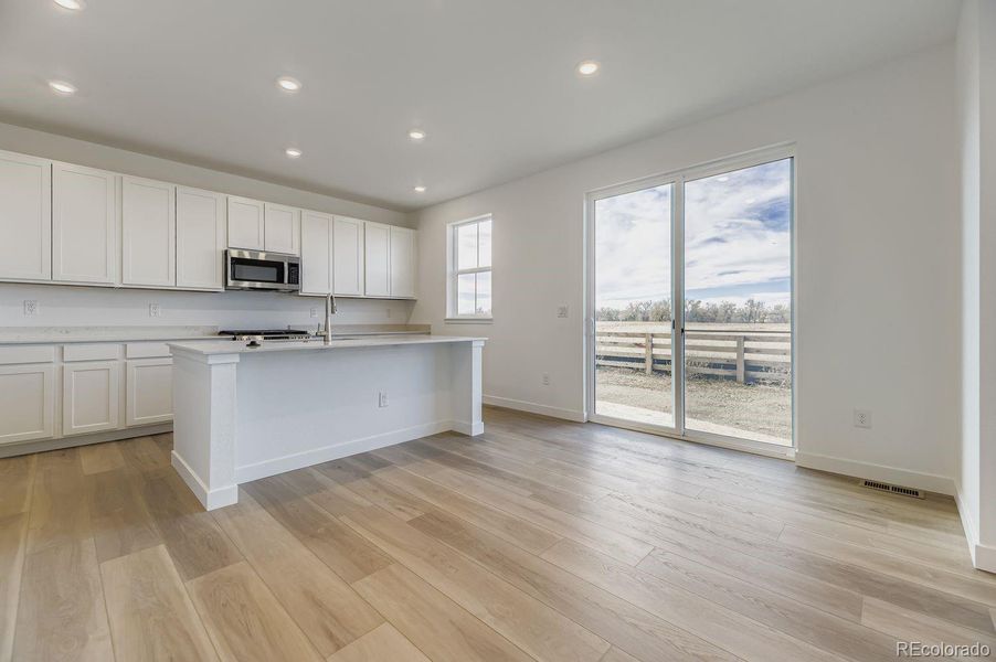 Spacious, unfurnished interior of a new home in Vermilion Creek: The Pioneer Collection, Centennial (Image 11).