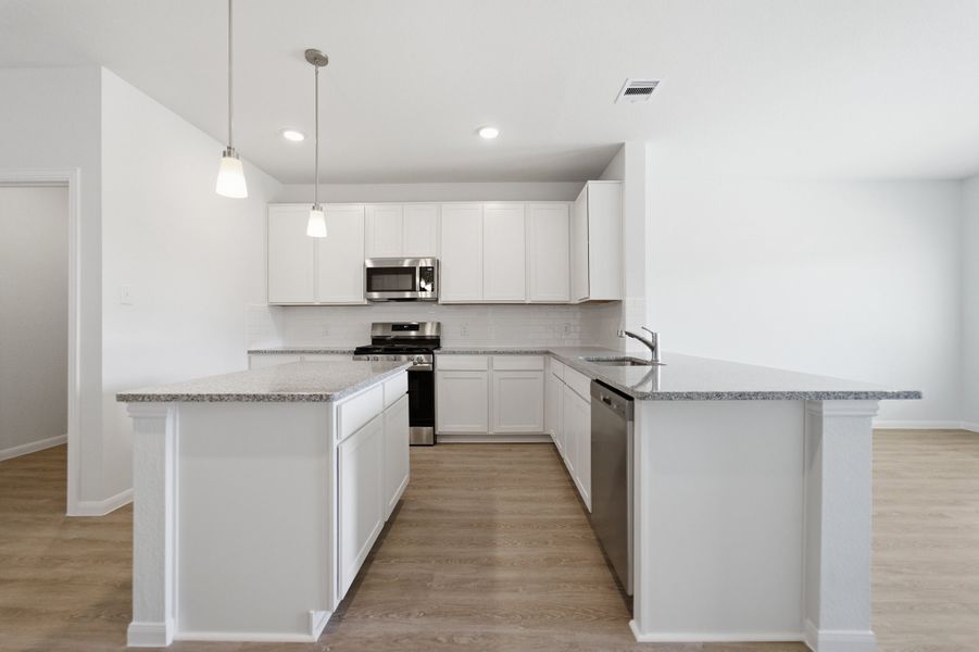 Furnished interior view inside a new home in The Pines at Seven Coves, Willis (Image 12).