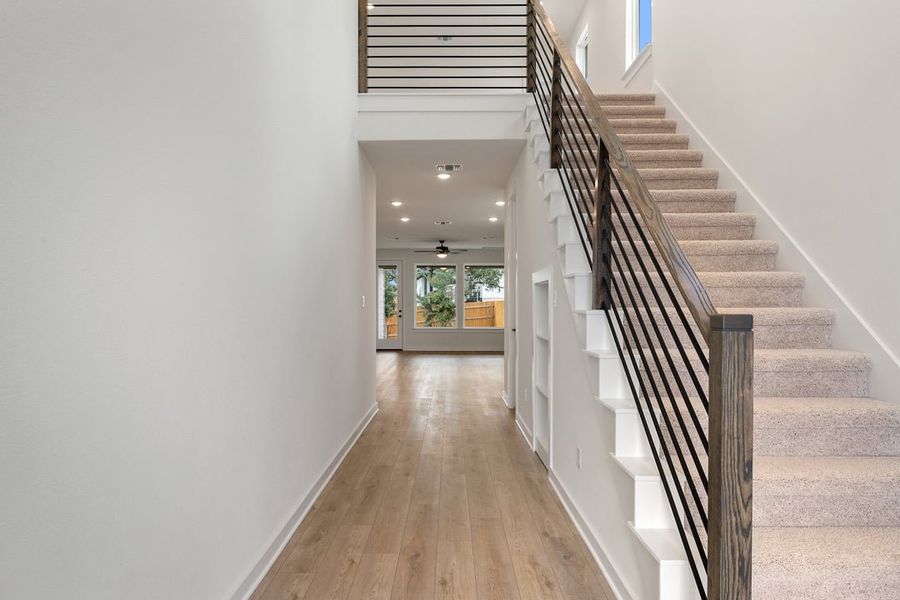 Spacious, unfurnished interior of a new home in Terrace Collection at Heritage, Dripping Springs (Image 19).