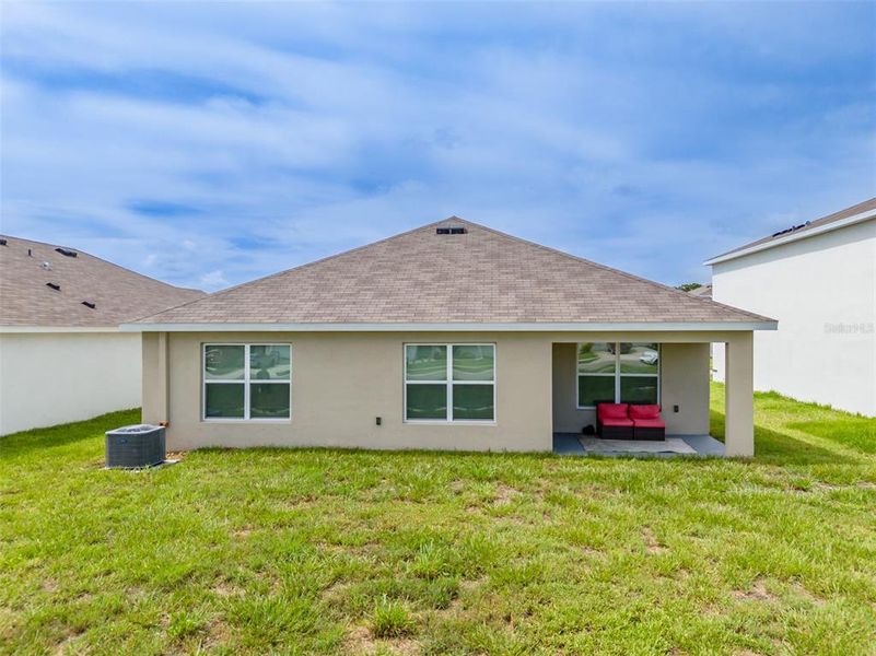 Front exterior of a new home in Brookside, Ruskin, FL, highlighting curb appeal (Image 2). Front exterior of a new home in Brookside, Ruskin, FL, highlighting curb appeal (Image 2).