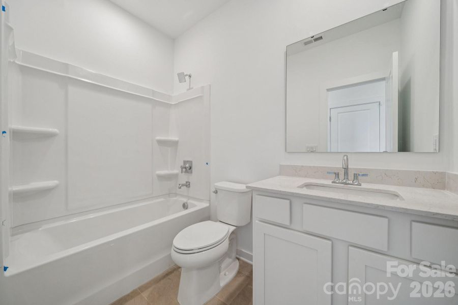 Furnished interior view inside a new home in Meadow Creek Village, Locust (Image 6).