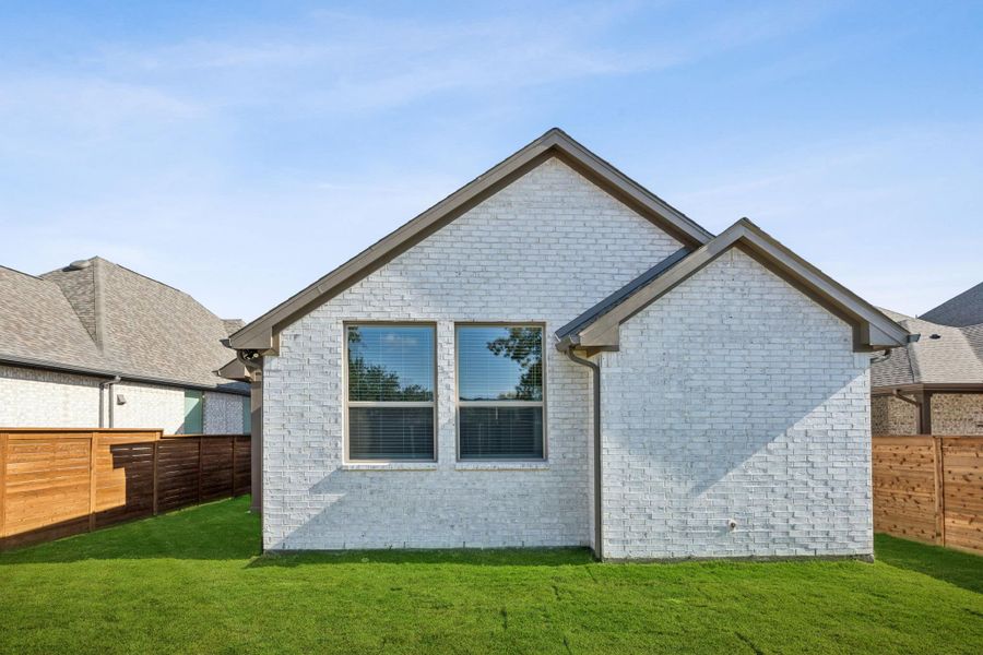 Exterior details and patio area of a home in Solterra Texas, Mesquite (Image 3).
