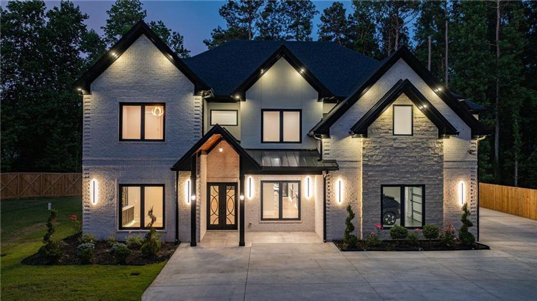 Front exterior of a new home in , Lawrenceville, GA, highlighting curb appeal (Image 38). Front exterior of a new home in , Lawrenceville, GA, highlighting curb appeal (Image 38).