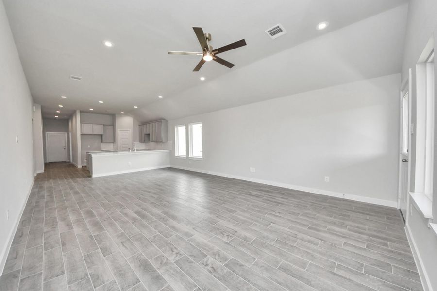 Take another glimpse into the heart of the home with this additional view of the family room—a sprawling space ready to accommodate all your gatherings. Sample photo of completed home with similar floor plan. Actual colors and selections may vary. Take another glimpse into the heart of the home with this additional view of the family room—a sprawling space ready to accommodate all your gatherings. Sample photo of completed home with similar floor plan. Actual colors and selections may vary.