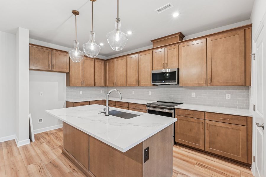 Representative furnished interior of a home built from the Onslow by Tri Pointe Homes in Summit At Homestead, Chapel Hill (Image 8).
