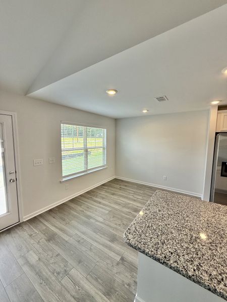 Spacious, unfurnished interior of a new home in Stone Fort Meadows, Manchester (Image 4).
