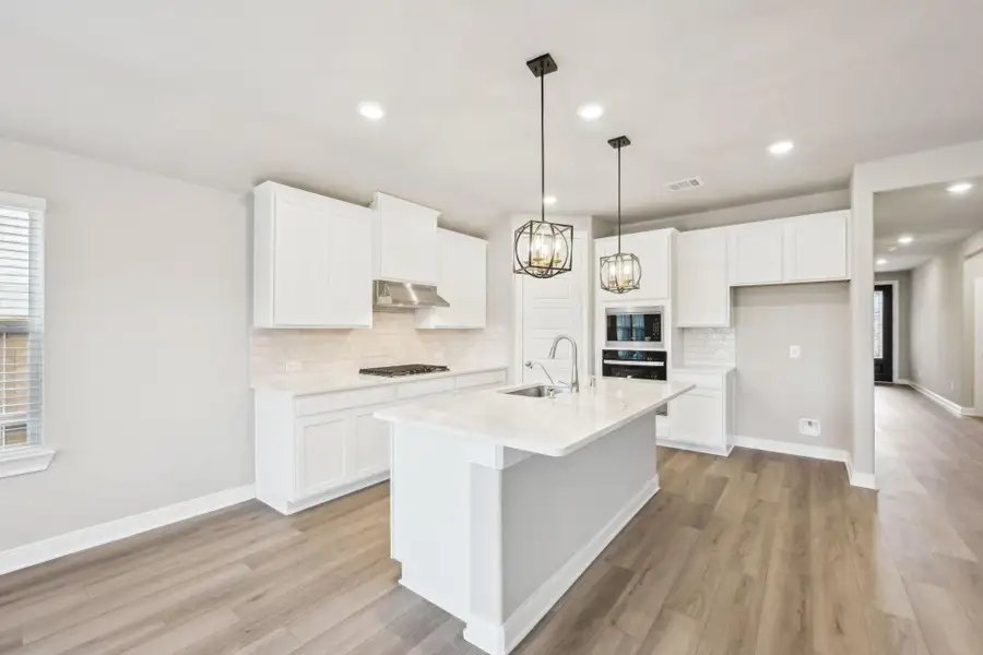 Photo is not of the actual home, but is an inspirational photo of builder’s model home and may depict options, furnishings, and/or decorator features that are not included