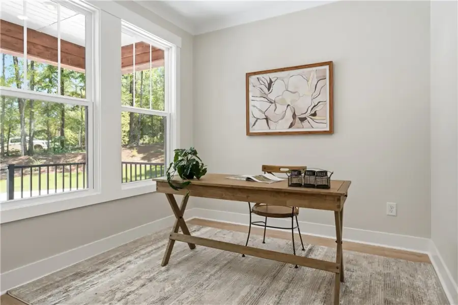 Crisp crown molding and large double-hung windows