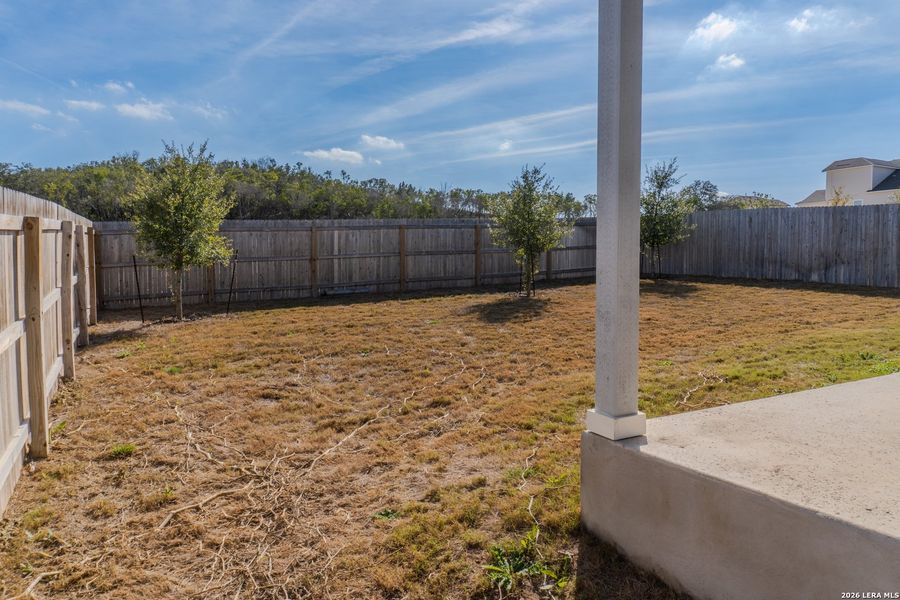 Exterior details and patio area of a home in The Meadows at Hunters Ranch, San Antonio (Image 26). Exterior details and patio area of a home in The Meadows at Hunters Ranch, San Antonio (Image 26).