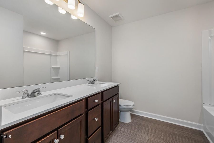 Furnished interior view inside a new home in Springvale, Fuquay Varina (Image 12).