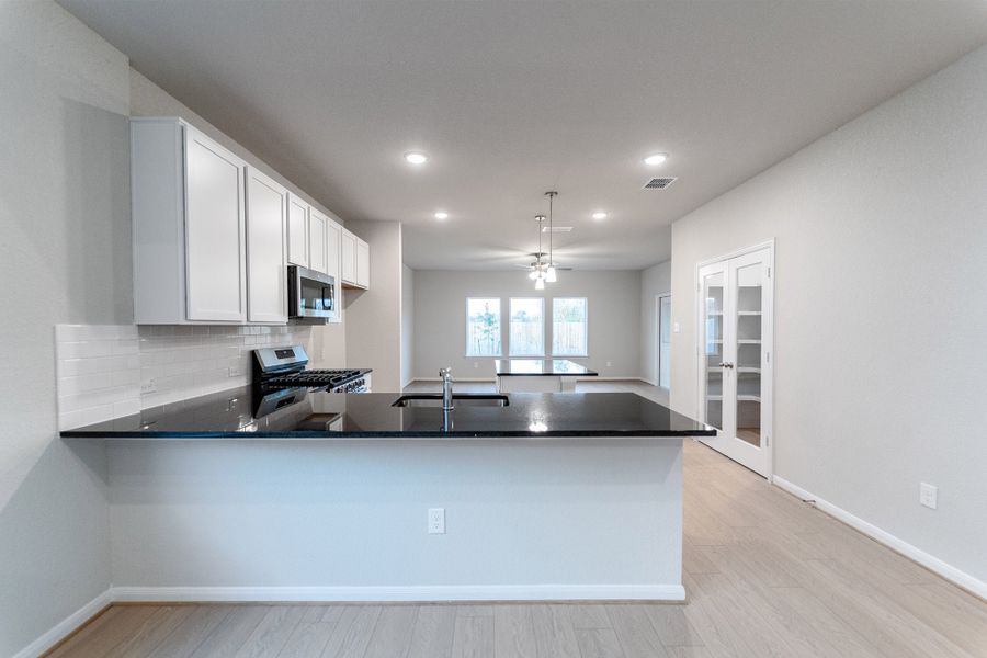 Furnished interior view inside a new home in Hennersby Hollow, San Antonio (Image 3). Furnished interior view inside a new home in Hennersby Hollow, San Antonio (Image 3).