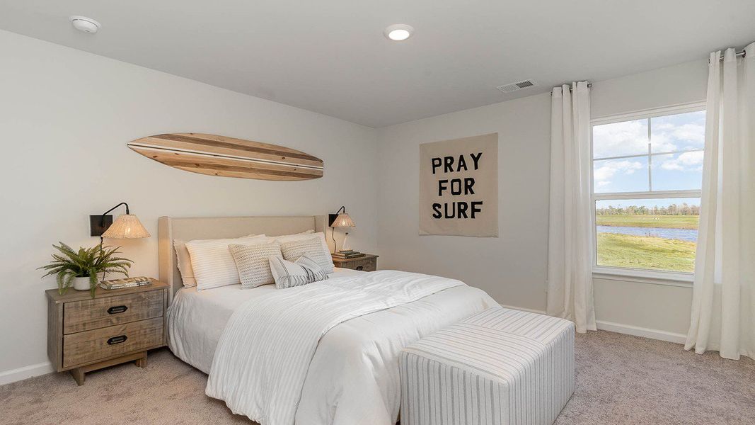 Furnished interior in a model home at South Island landing in Georgetown (Image 38).