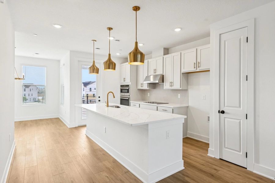 Furnished interior view inside a new home in Parkview at Hamlin, Winter Garden (Image 7).