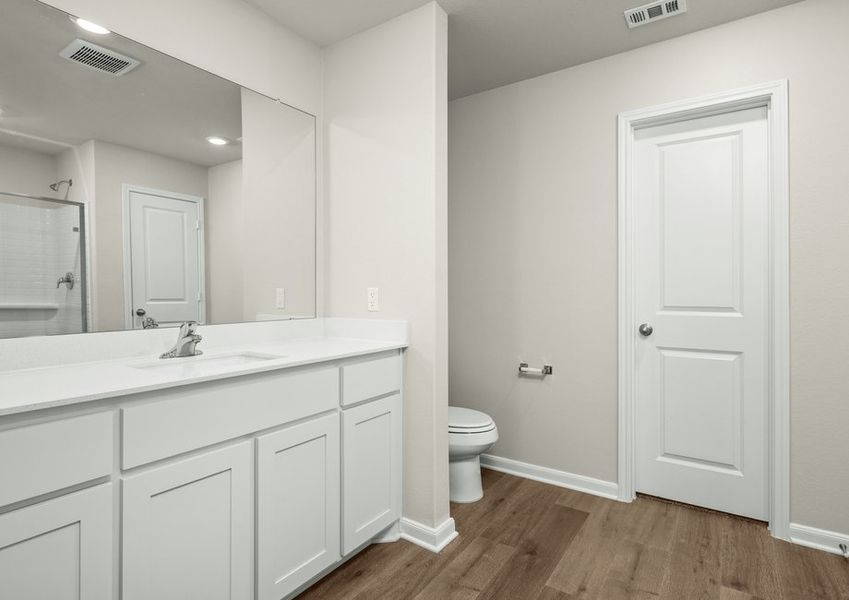 The master bathroom has a sprawling vanity. The master bathroom has a sprawling vanity.