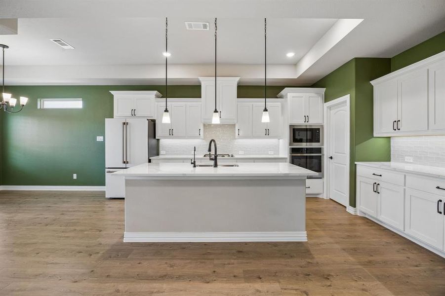 quartz counters, island, impeccable lighting quartz counters, island, impeccable lighting