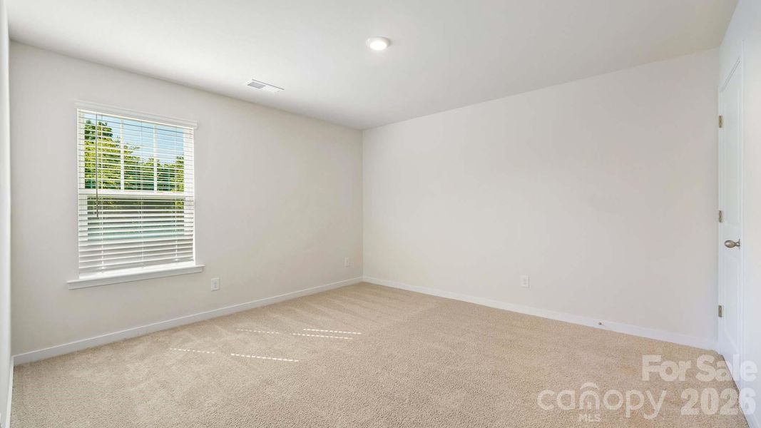 Spacious, unfurnished interior of a new home in Secrest Commons, Monroe (Image 21).