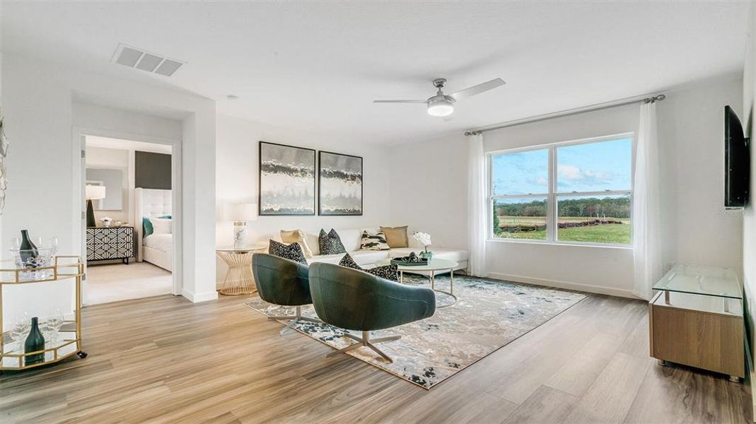 Furnished interior view inside a new home in Buena Lago, St. Cloud (Image 12).