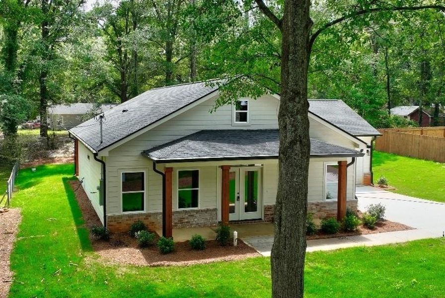 Front exterior of a new home in , Monroe, GA, highlighting curb appeal (Image 2).