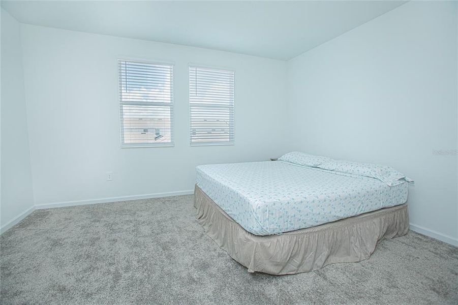 Furnished interior view inside a new home in Tohoqua, Kissimmee (Image 11).