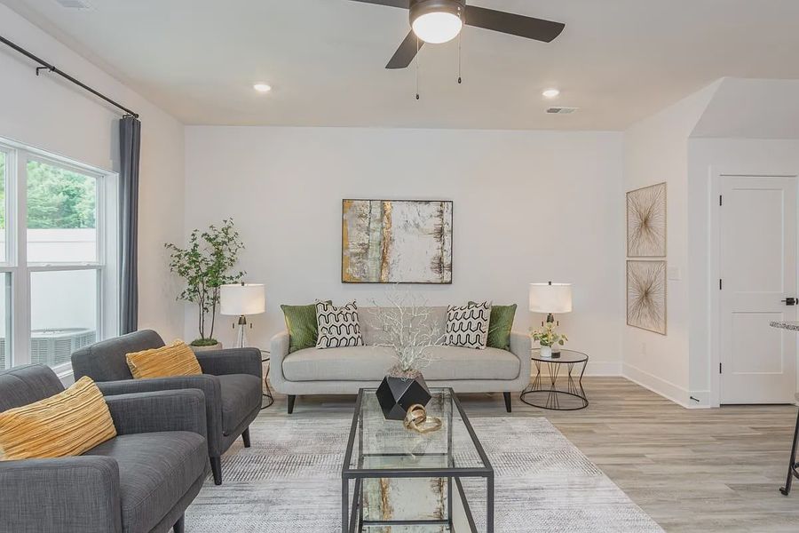 Representative furnished interior of a home built from the 1557 Townhome by Adams Homes in Parkstone Place Townhomes, Roebuck (Image 8).