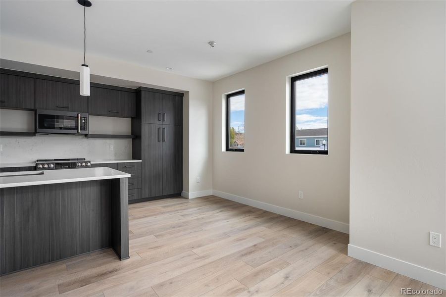 Kitchen and dining area Kitchen and dining area
