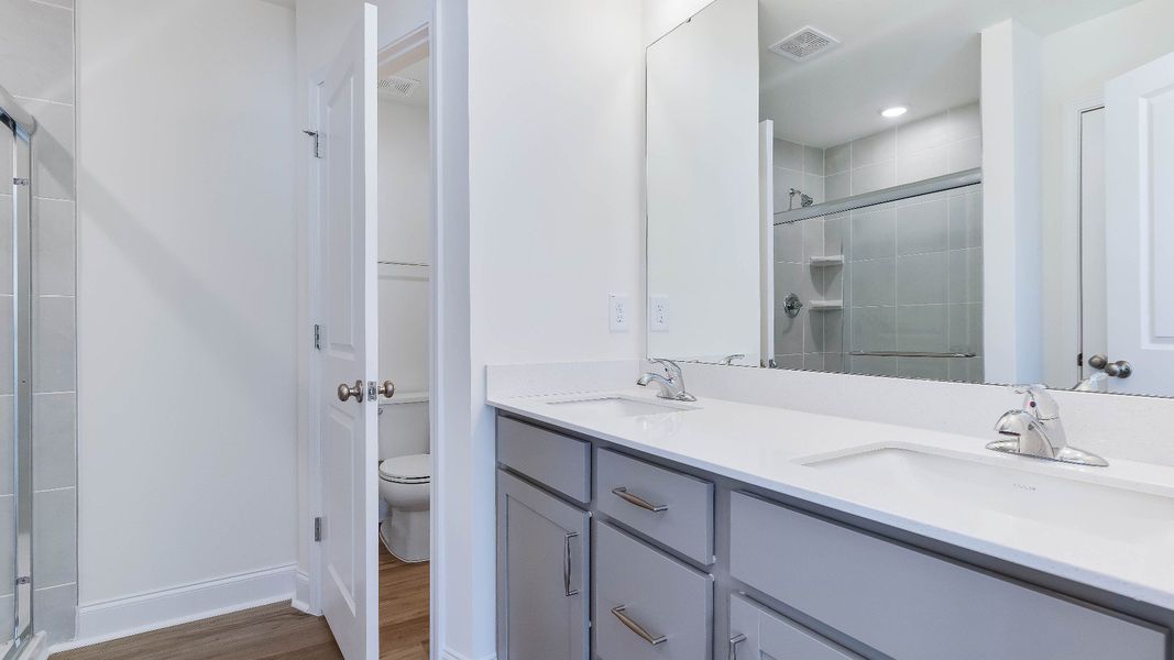 Furnished interior view inside a new home in Battle Bridge, Raleigh (Image 30).