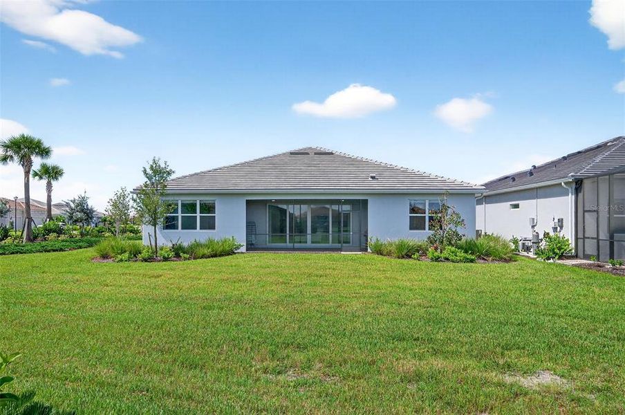 Front exterior of a new home in , Englewood, FL, highlighting curb appeal (Image 27). Front exterior of a new home in , Englewood, FL, highlighting curb appeal (Image 27).