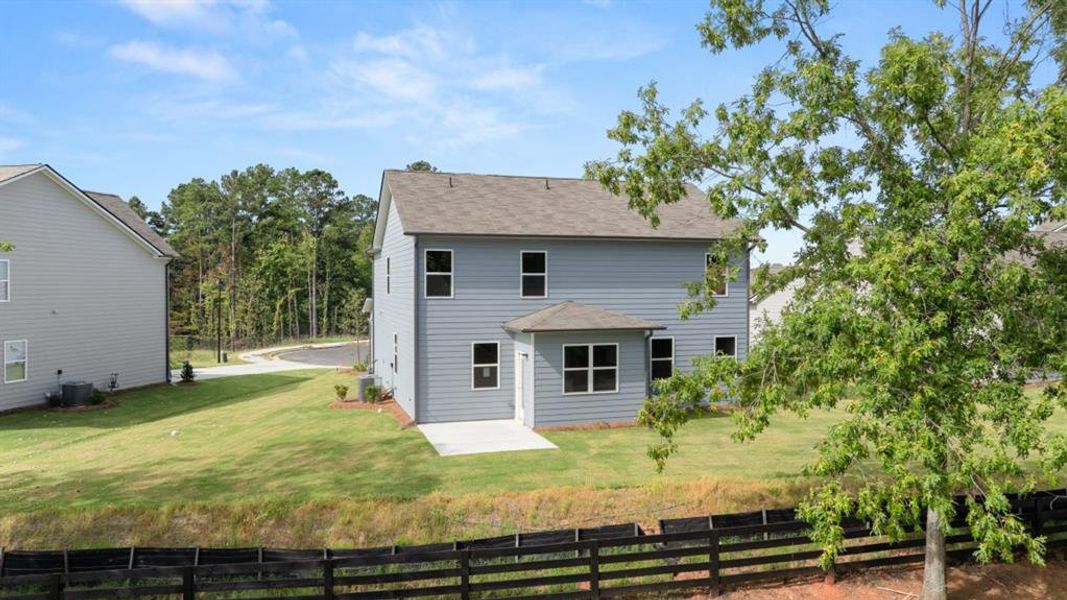 Exterior details and patio area of a home in Fairway 17 at Mirror Lake, Villa Rica (Image 21).