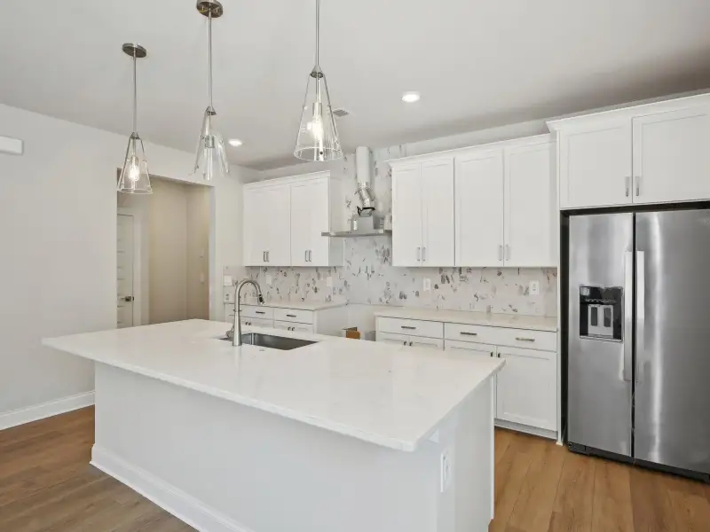 Furnished interior view inside a new home in Martin Springs - Cottage Series, Lawrenceville (Image 5).
