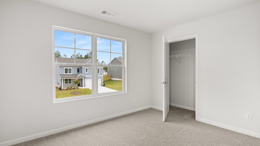 Representative unfurnished interior of a home built from the Hayden by D.R. Horton in Liberty Crossing, Braselton (Image 28).