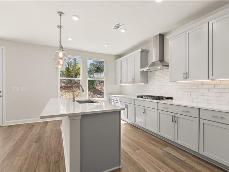 Furnished interior view inside a new home in Melody Lakeside Estates, Buford (Image 6).