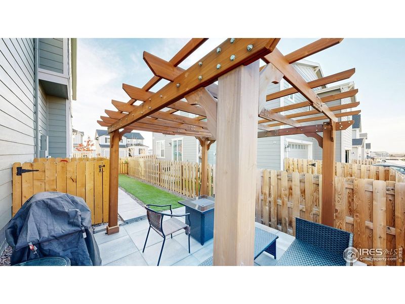 Exterior details and patio area of a home in , Commerce City (Image 24).