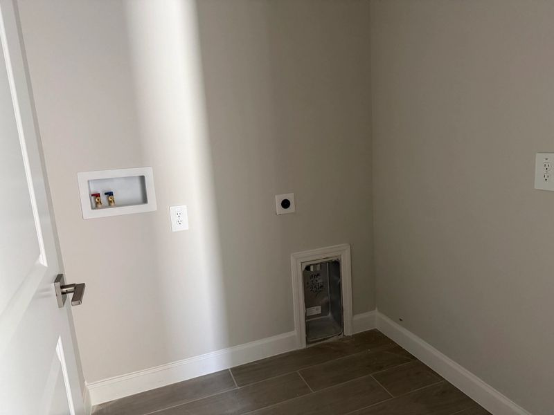 Spacious second-floor laundry room Spacious second-floor laundry room