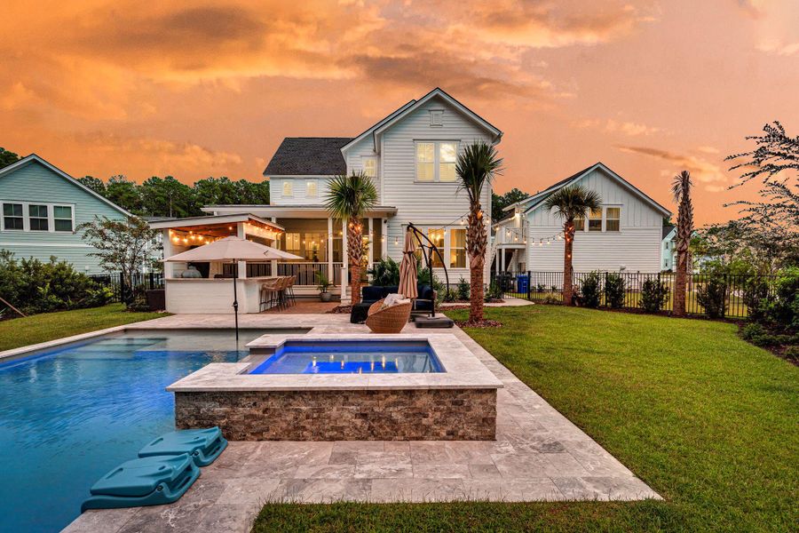 Front exterior of a new home in Carolina Park: Riverside, Mount Pleasant, SC, highlighting curb appeal (Image 27). Front exterior of a new home in Carolina Park: Riverside, Mount Pleasant, SC, highlighting curb appeal (Image 27).