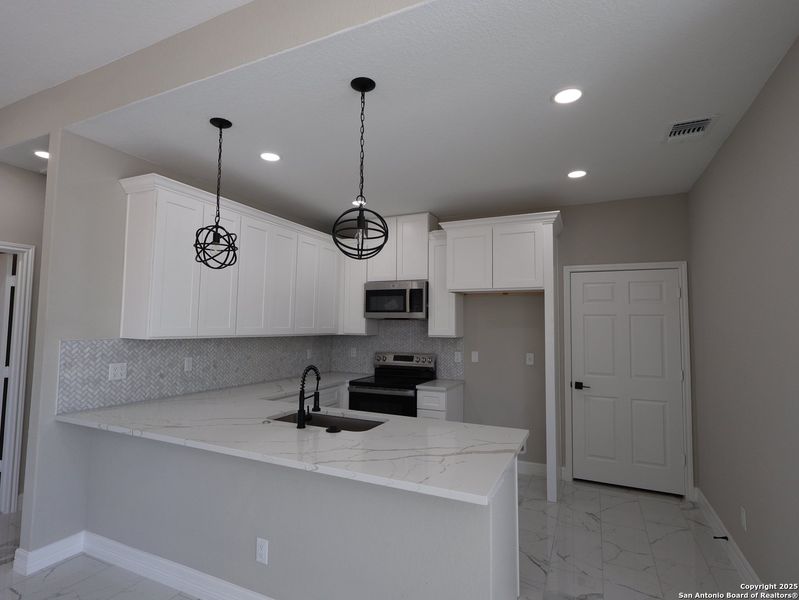 Furnished interior view inside a new home in , Von Ormy (Image 4).